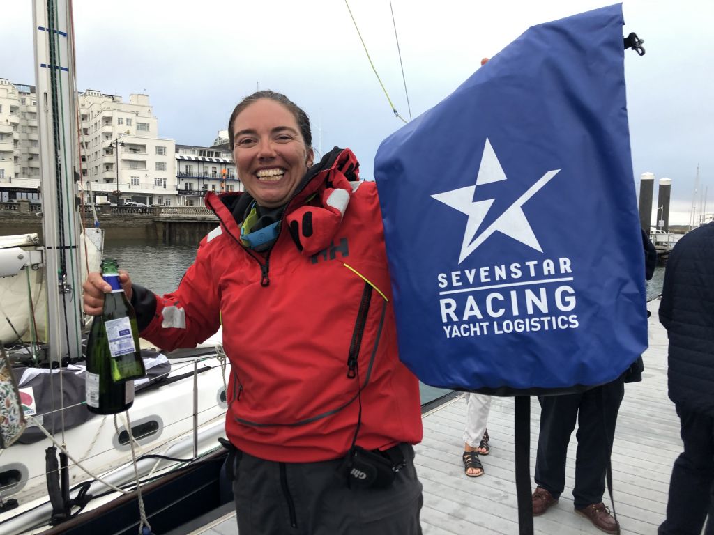 Louise Clayton celebrates on the dock © RORC 
